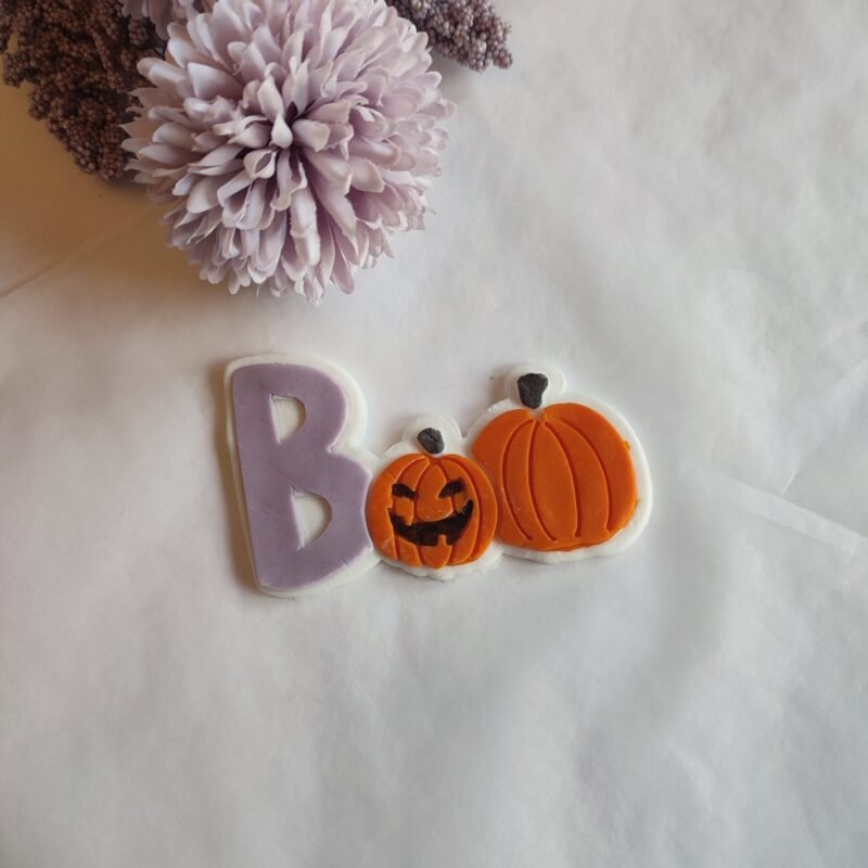 Halloween boo with pumpkins