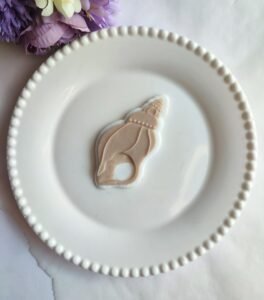Seashell debosser