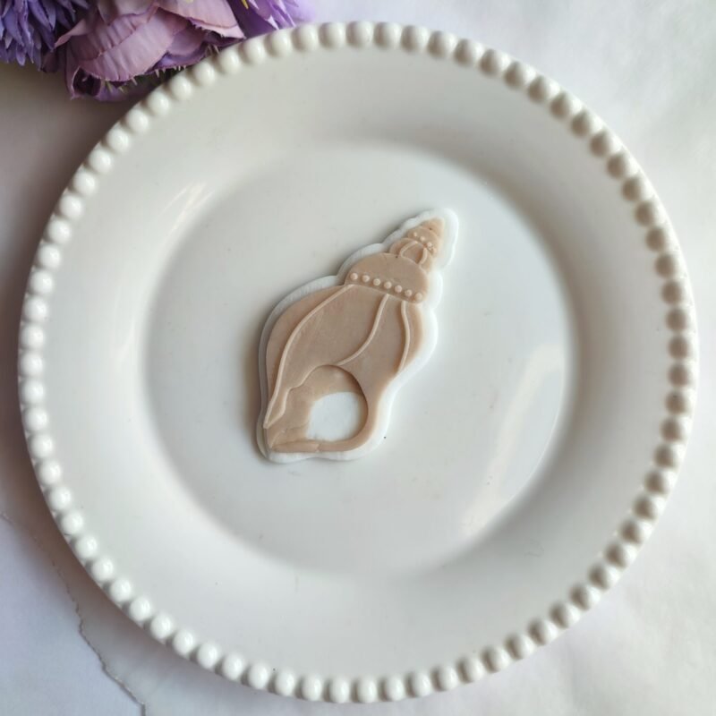 Seashell debosser