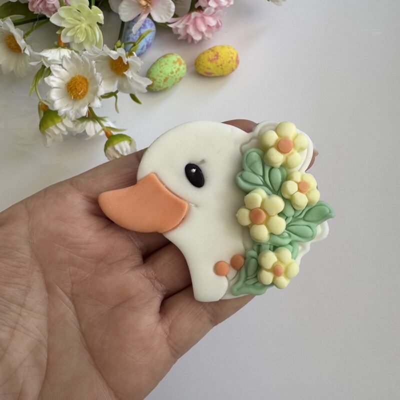 Cute goose with flowers