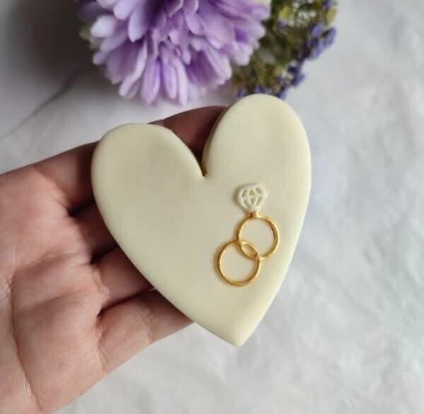 Heart with wedding rings