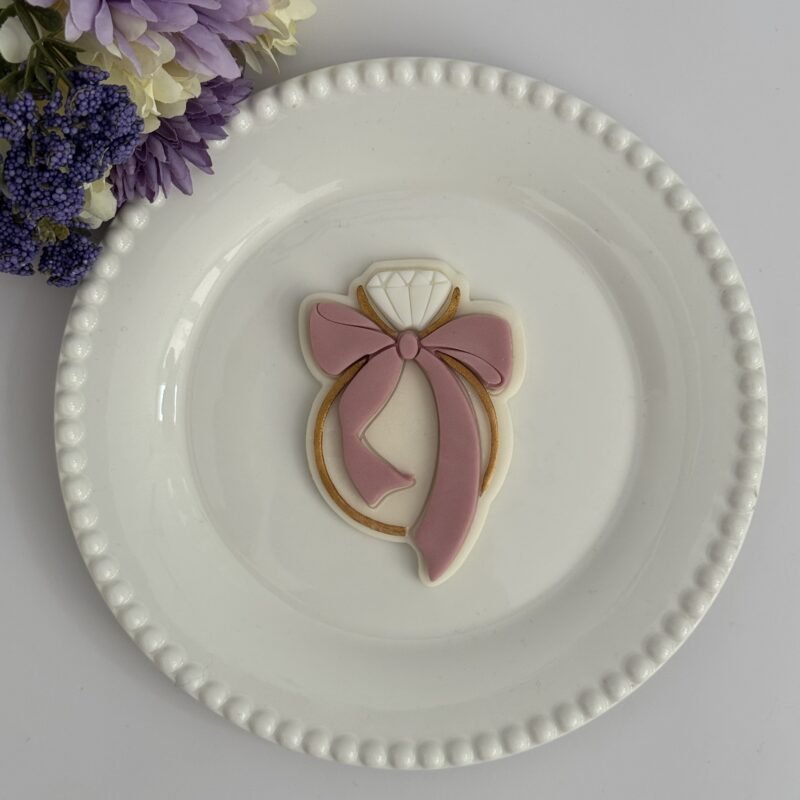 Wedding ring with bow