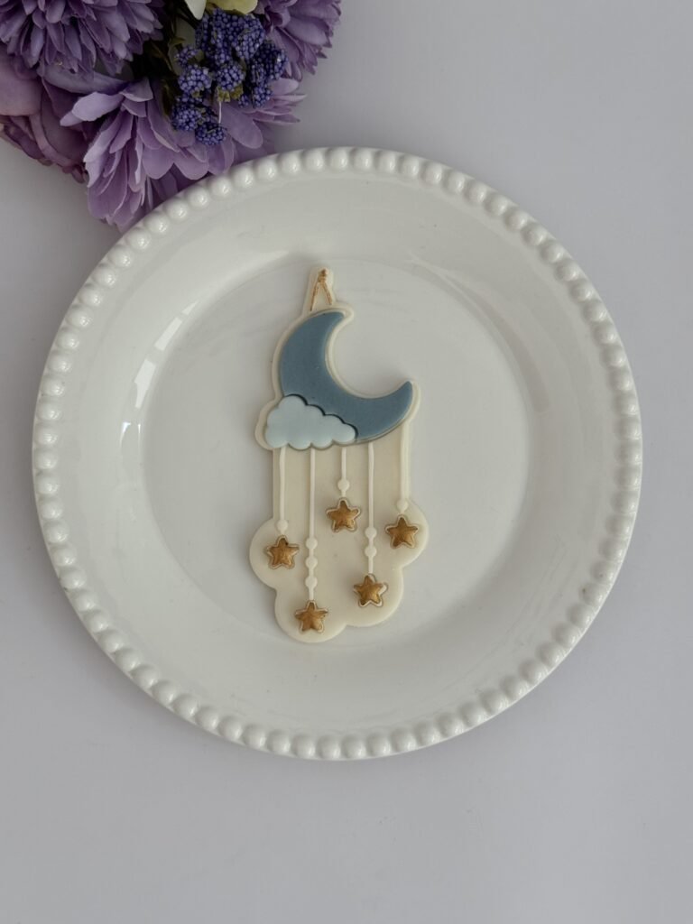 Moon with hanging stars