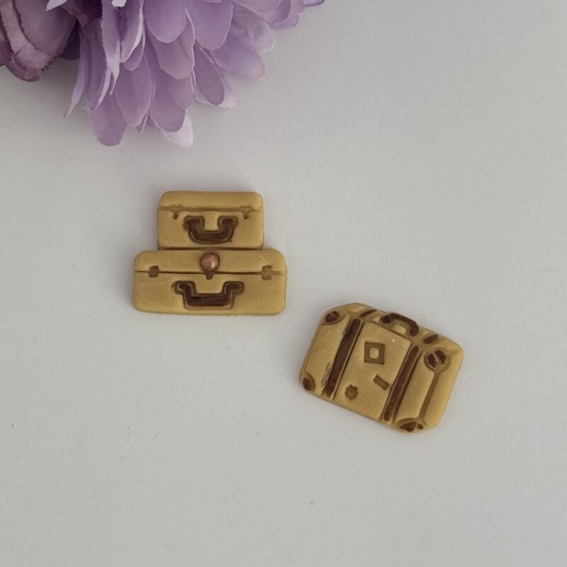 2 mini suitcases
