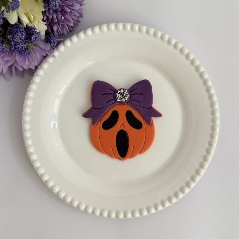 Ghostface pumpkin with bow